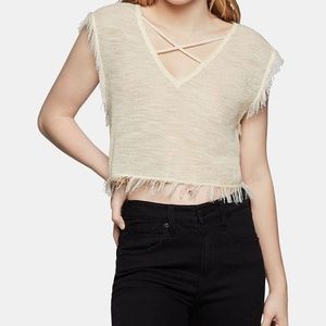 BCBGeneration v-neck fringe mesh crop blouse in cream color